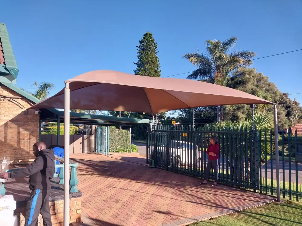 Brown shade carport, home entrance